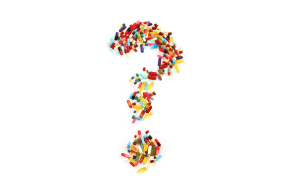 question mark made of pills