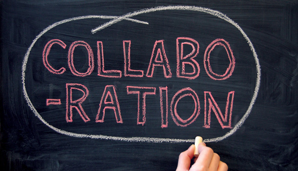 hand writing Collaboration on chalkboard