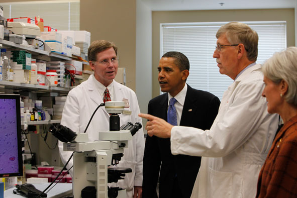 President Barack Obama tours an oncology laboratory with Health and Human Services Secretary Kathleen Sebelius, right, in September, 2009, at the National Institute of Health in Bethesda, Maryland. At left is Dr. Marston Linehan, Dr. Francis Collins is second from right.